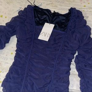Ruffled Navy Body Suit
